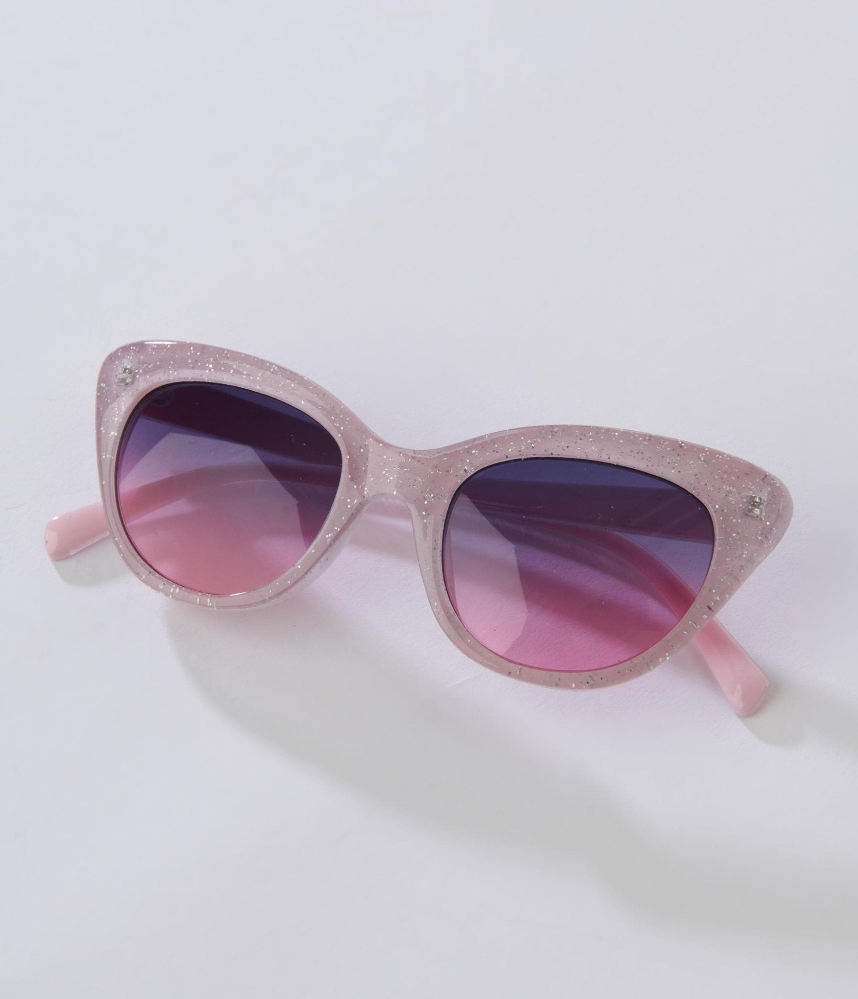 https://www.unique-vintage.com/cdn/shop/products/pink-glitter-cat-eye-sunglasses-631741.jpg?v=1703096647&width=1946