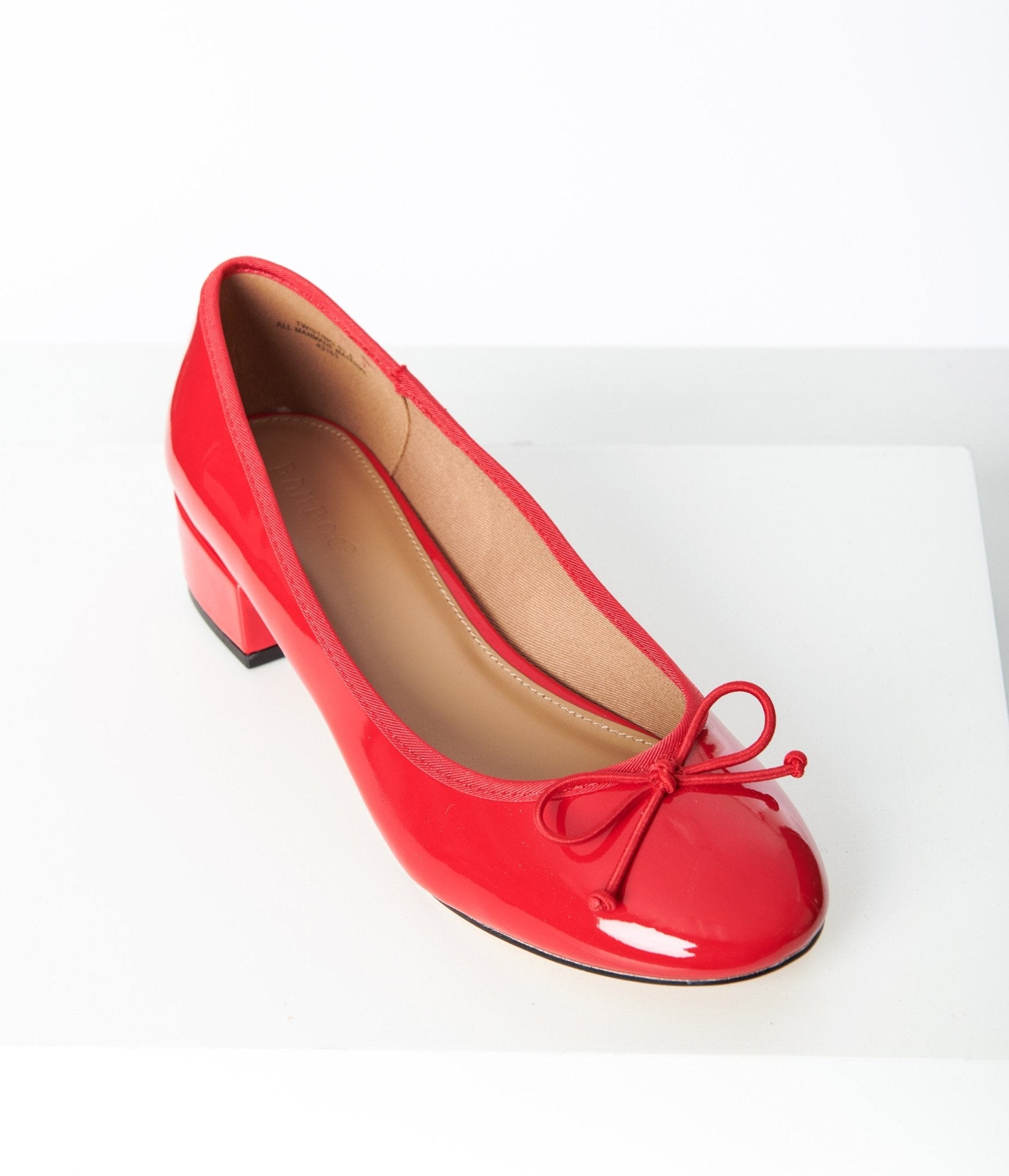 Red patent leather store kitten heels