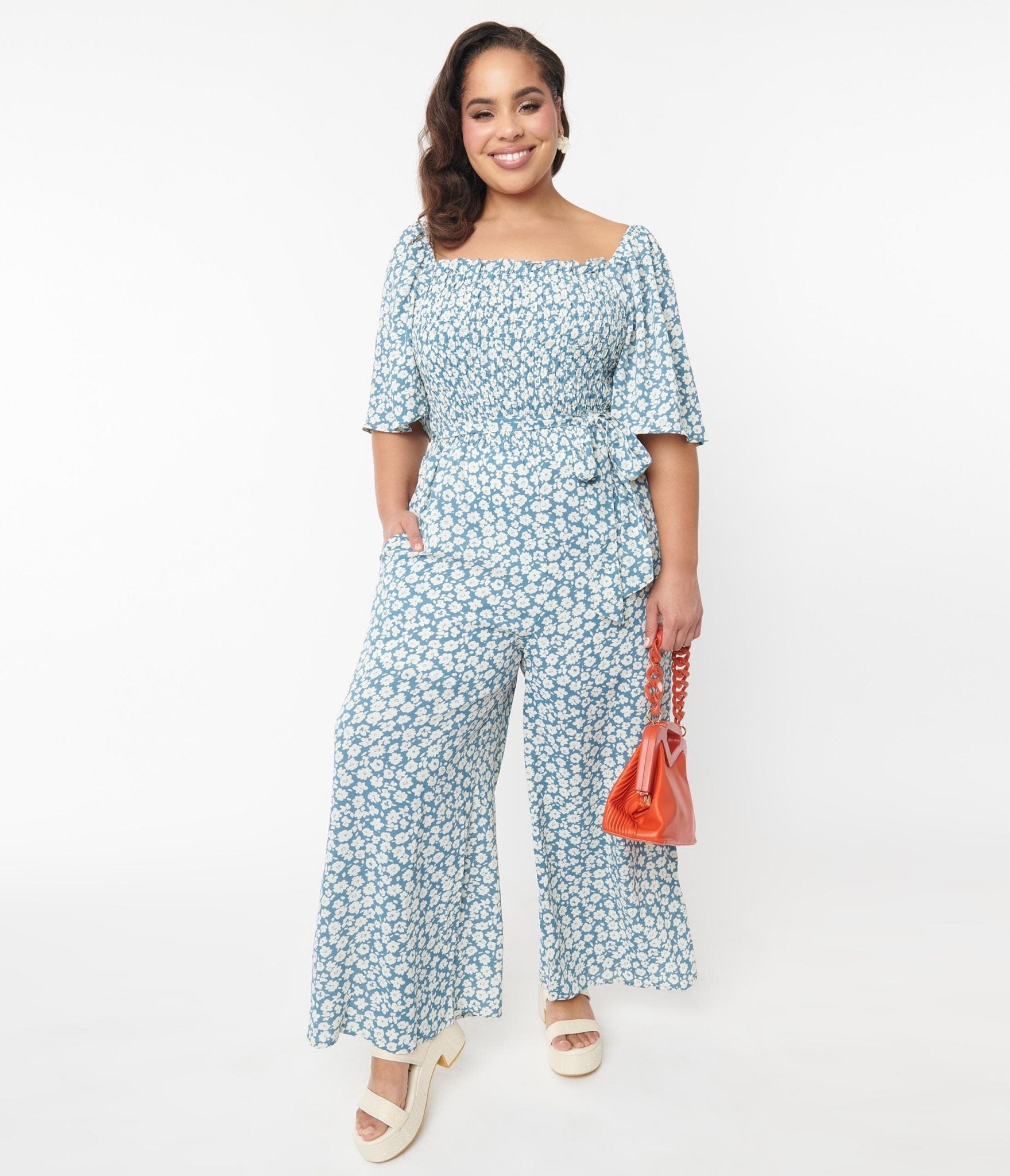 Teal store floral jumpsuit